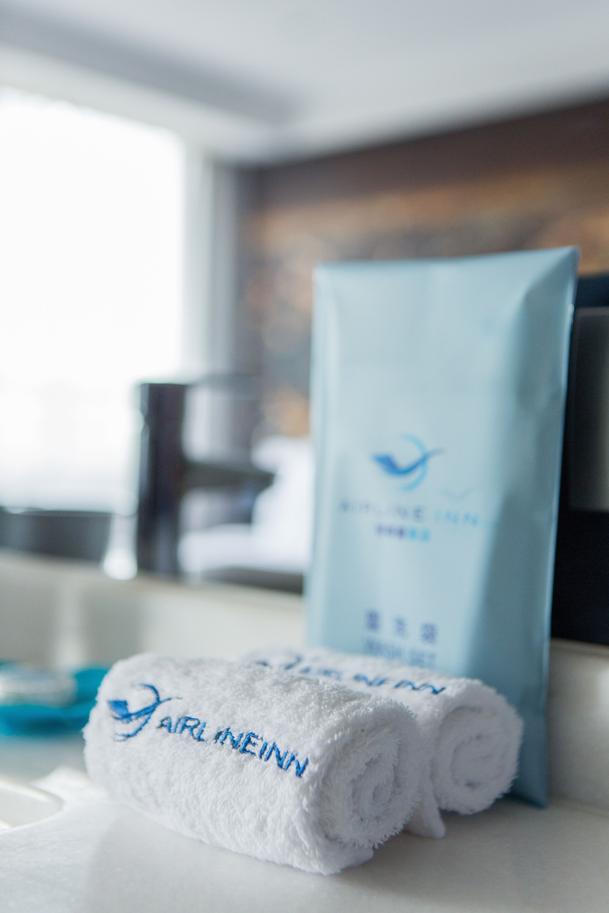 deluxe twin room | bathroom | shower, hair dryer, towels, soap