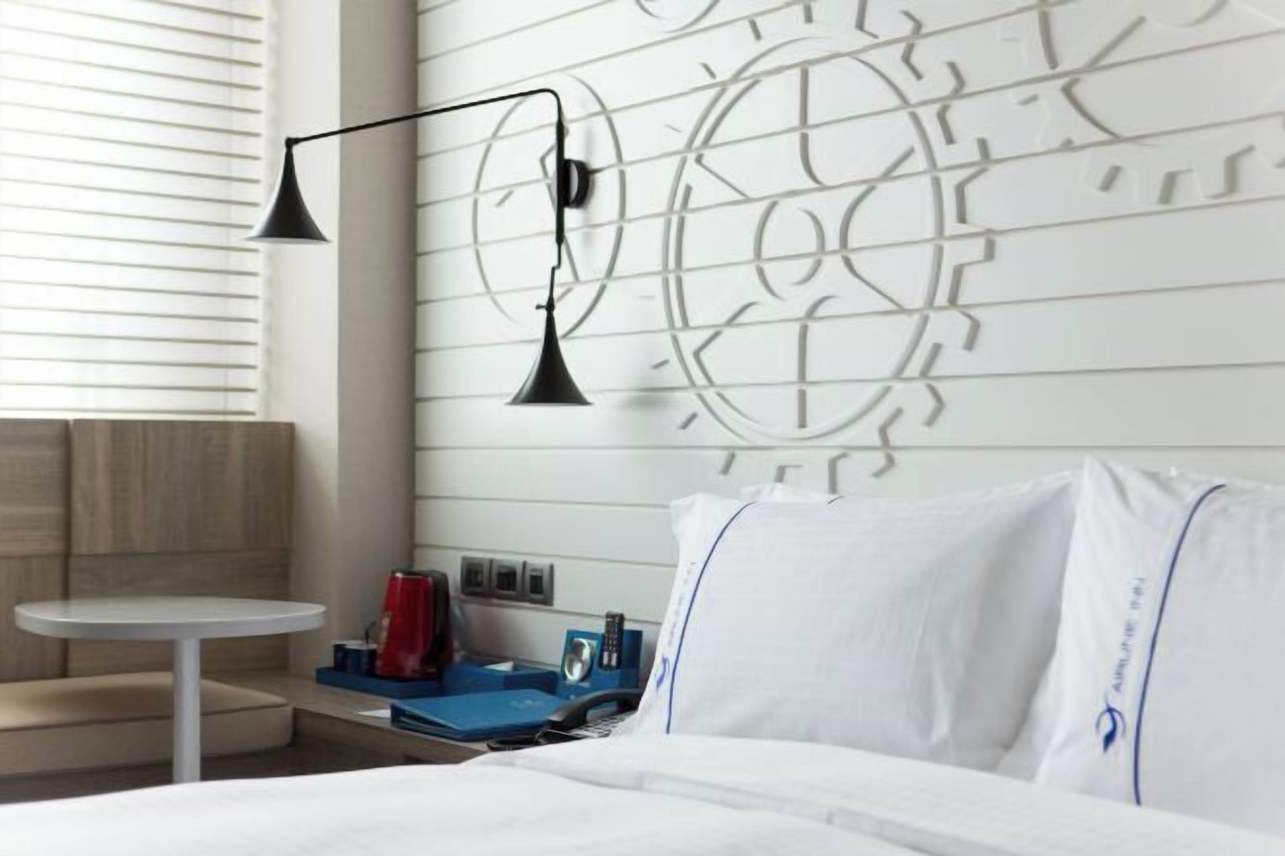 Premium bedding, down comforters, in-room safe, desk