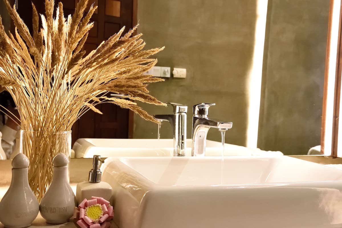 junior suite king with pool view | bathroom sink