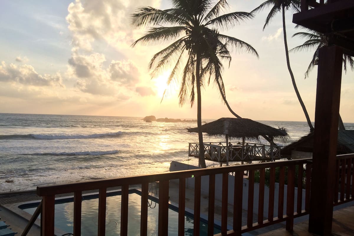 Chambre Double Deluxe, vue mer, en front de plage | Balcon