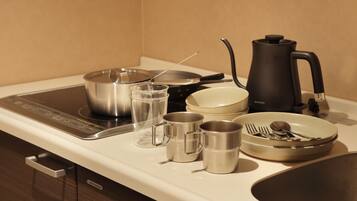 Family Suite Room | Private kitchen | Fridge, electric kettle, toaster