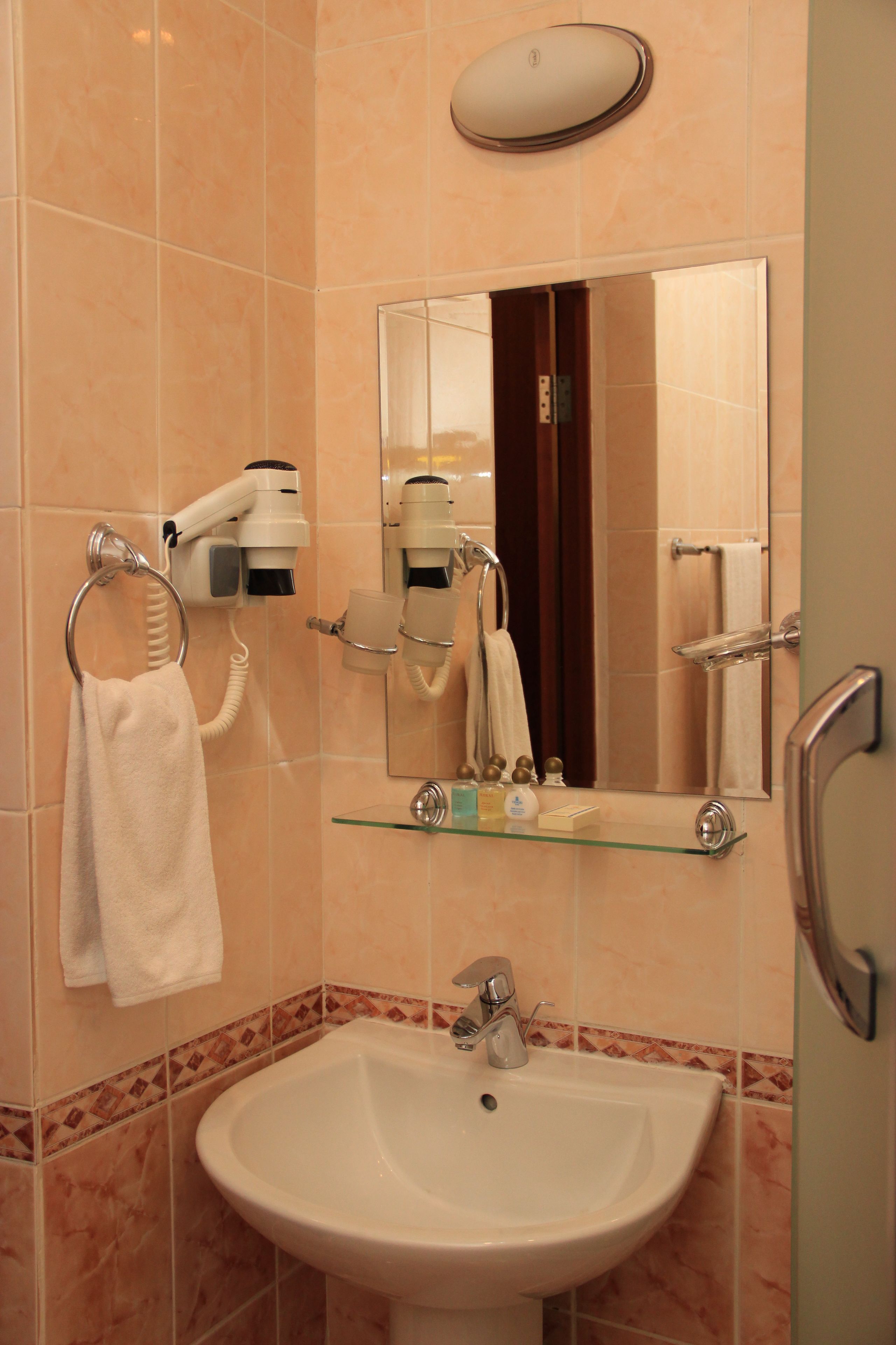 shower, free toiletries, hair dryer, slippers