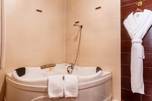 Shower, free toiletries, hair dryer, slippers