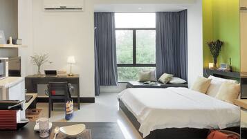 Deluxe Room | Private kitchen | Fridge