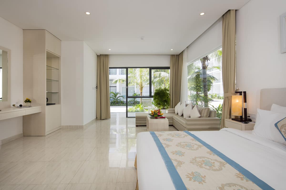 Bungalow, uitzicht op tuin | 1 slaapkamer, lakens van Egyptisch katoen, luxe beddengoed, een minibar