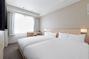 Desk, blackout curtains, free WiFi, bed sheets