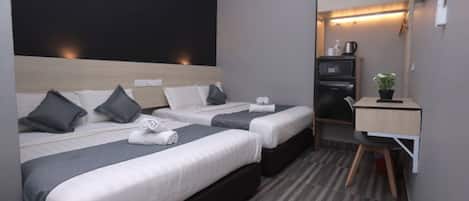 Suite familiar | Minibar, caja fuerte, sistema de insonorización y wifi gratis