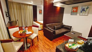 Exclusive Duplex, 1 King Bed with Sofa bed | Living area | 32-inch LCD TV with digital channels - Khanna Fiesta, A Bergamont Hotel - Vellore (Vellore)