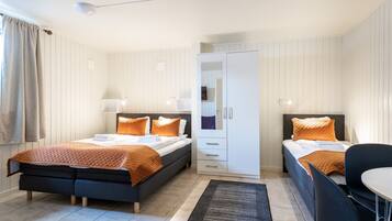 Chambre Triple Confort | Surmatelas, fer et planche à repasser, Wi-Fi gratuit, draps fournis
