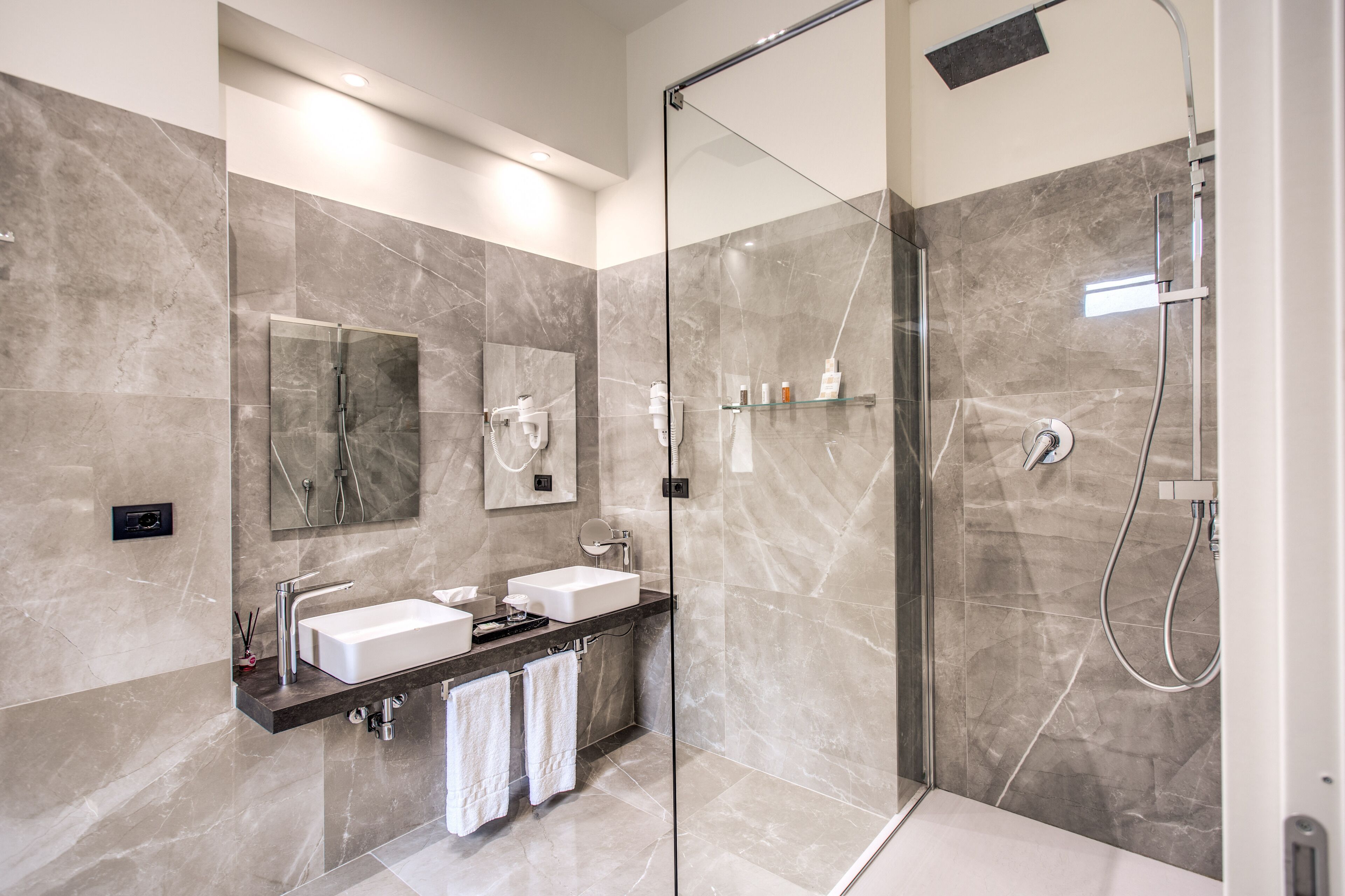 Rainfall showerhead, slippers, bidet, towels