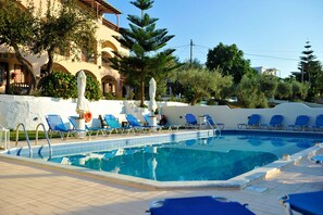 Outdoor pool, pool umbrellas, pool loungers