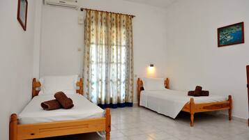 Apartment, 1 Bedroom, Pool View | In-room safe, iron/ironing board, free WiFi, bed sheets