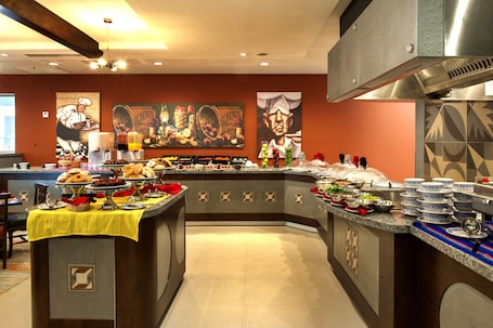 Breakfast, lunch, dinner served; international cuisine