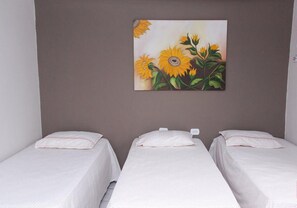 Standard Triple Room | Individually decorated, blackout curtains, free WiFi
