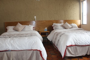 Family Room, 2 Queen Beds | In-room safe, desk, iron/ironing board, free WiFi