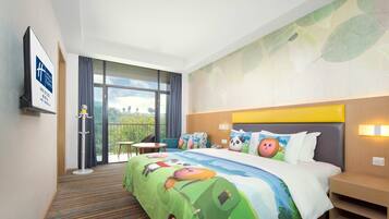 A hotel room with a large bed, a balcony with a view, and a coat rack.