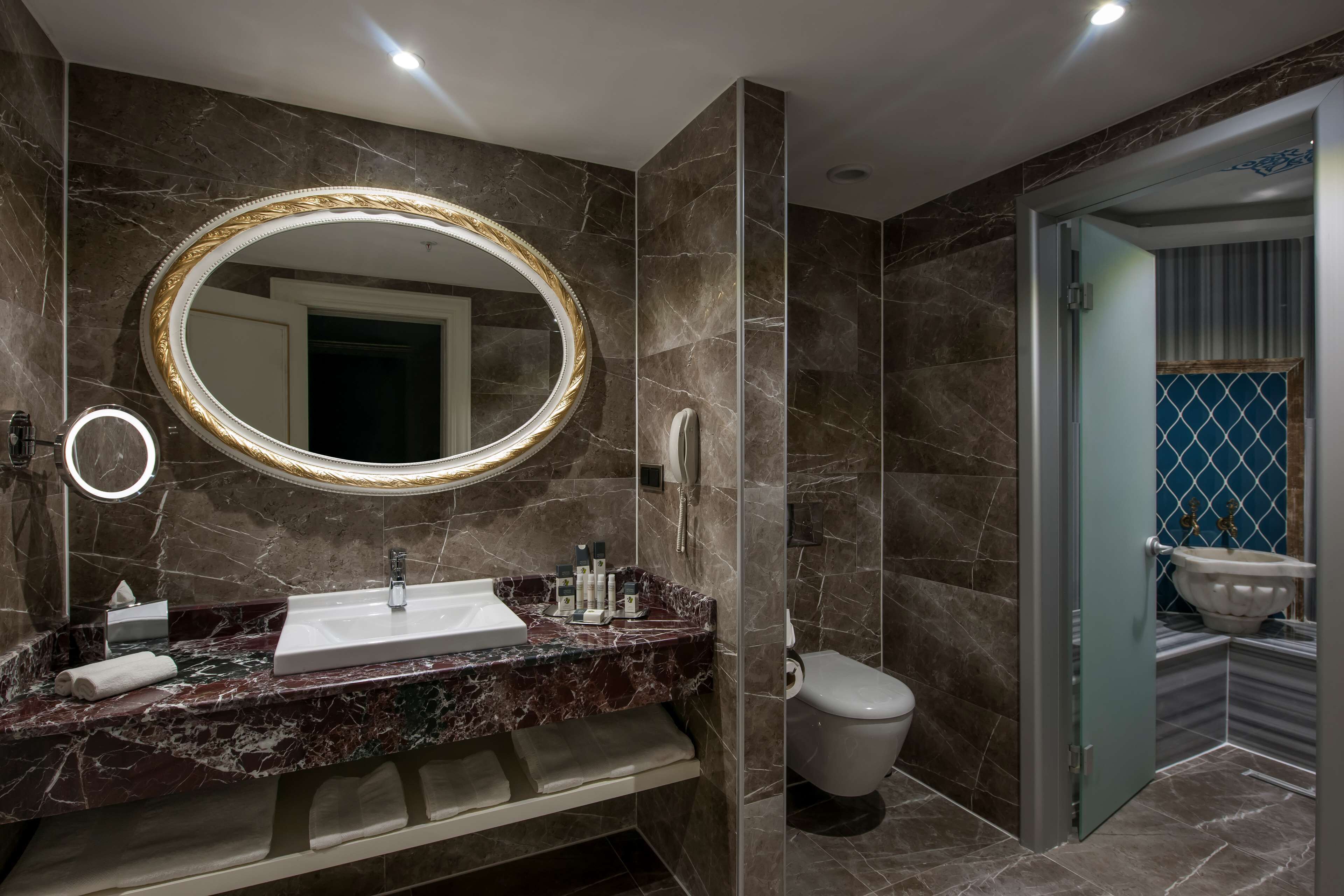 suite, 1 king bed, non smoking (harput) | bathroom | deep-soaking bathtub, hair dryer, slippers, towels