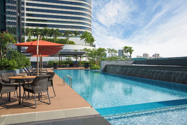 Outdoor pool, open 6:00 AM to 10:00 PM, pool umbrellas, sun loungers - Holiday Inn Singapore Little India by IHG (Singapore)