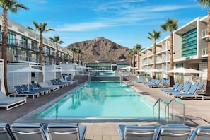 2 outdoor pools, open 6 AM to 10 PM, cabanas (surcharge), sun loungers
