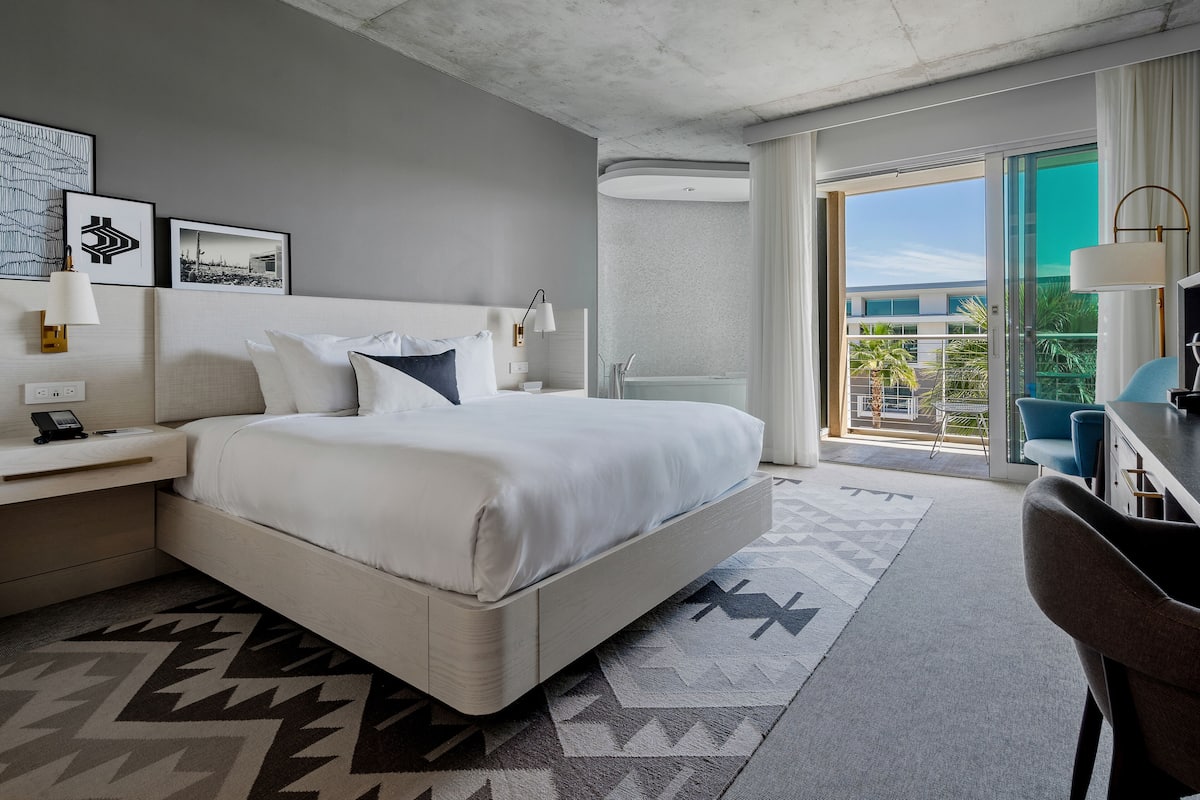 Premium bedding, down comforters, pillowtop beds, minibar
