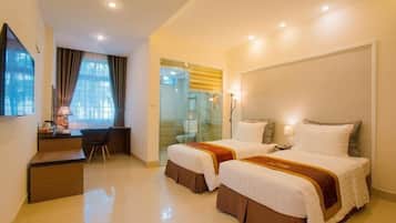 Habitación Deluxe | Minibar, escritorio, wifi gratis y ropa de cama