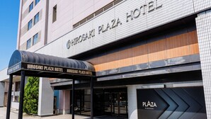 The exterior of Hiroaki Plaza Hotel with a covered entrance and a signboard. - Hirosaki Plaza Hotel (Hirosaki)