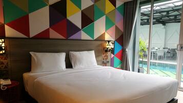 Deluxe Double or Twin Room, Pool Access | Minibar, in-room safe, desk, blackout curtains
