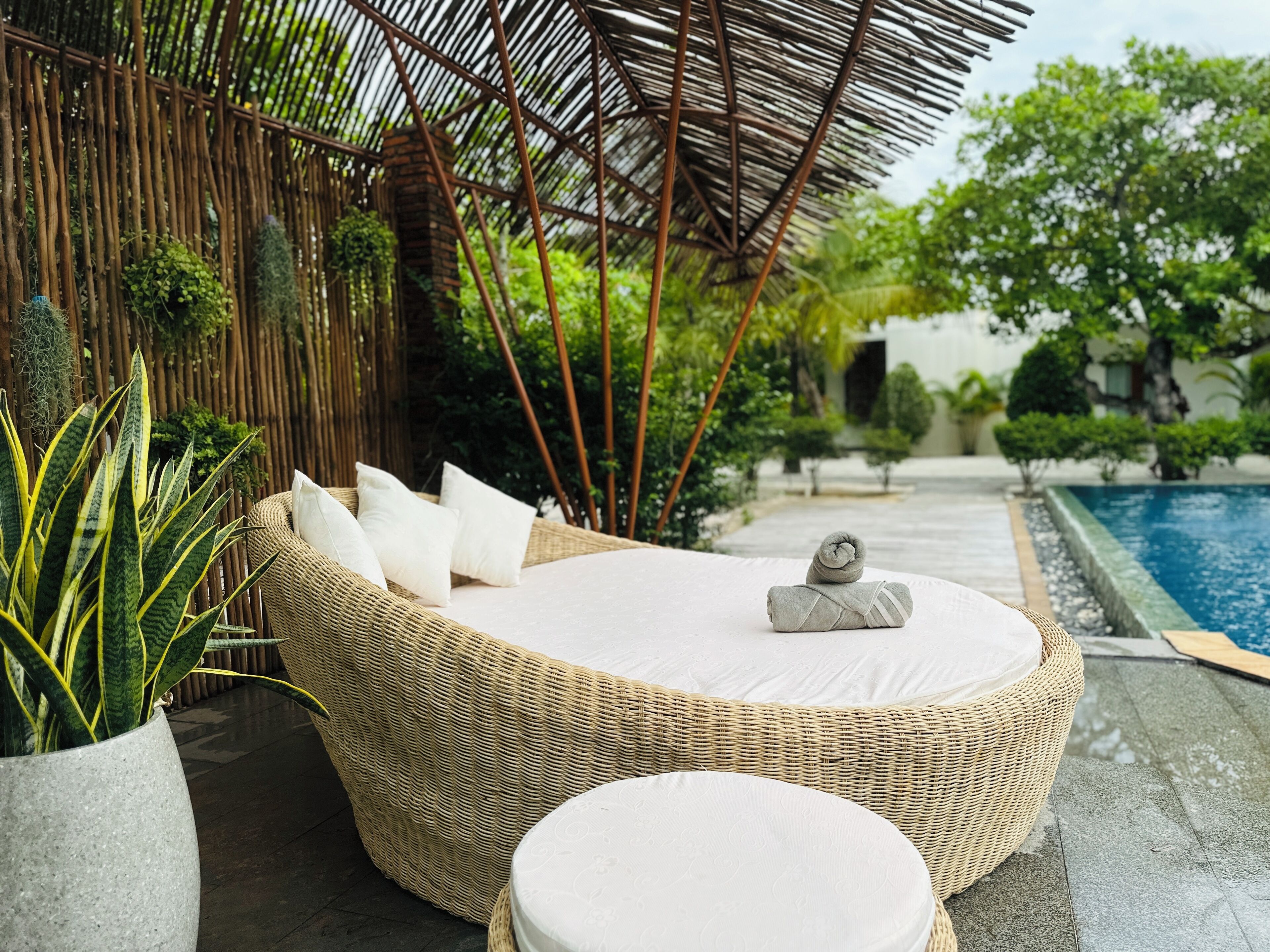 outdoor pool, pool umbrellas, pool loungers