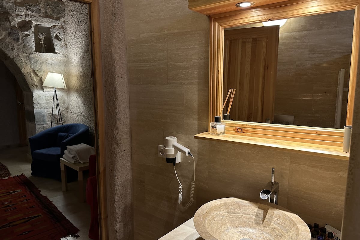 superior suite | bathroom | shower, rainfall showerhead, free toiletries, hair dryer