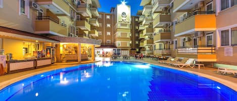 Outdoor pool, pool umbrellas, sun loungers