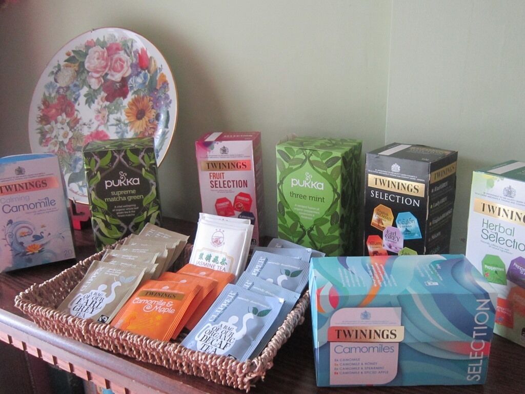 A display of Twinings tea products including Camomile, Matcha Green, and Herbal Selection.
