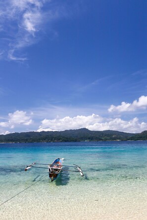 On the beach, white sand
