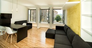 Premium Studio, 1 Double Bed, Kitchen, City View | Living area | 28-inch flat-screen TV with cable channels, TV - Cathedral Design Apartments (Porto)