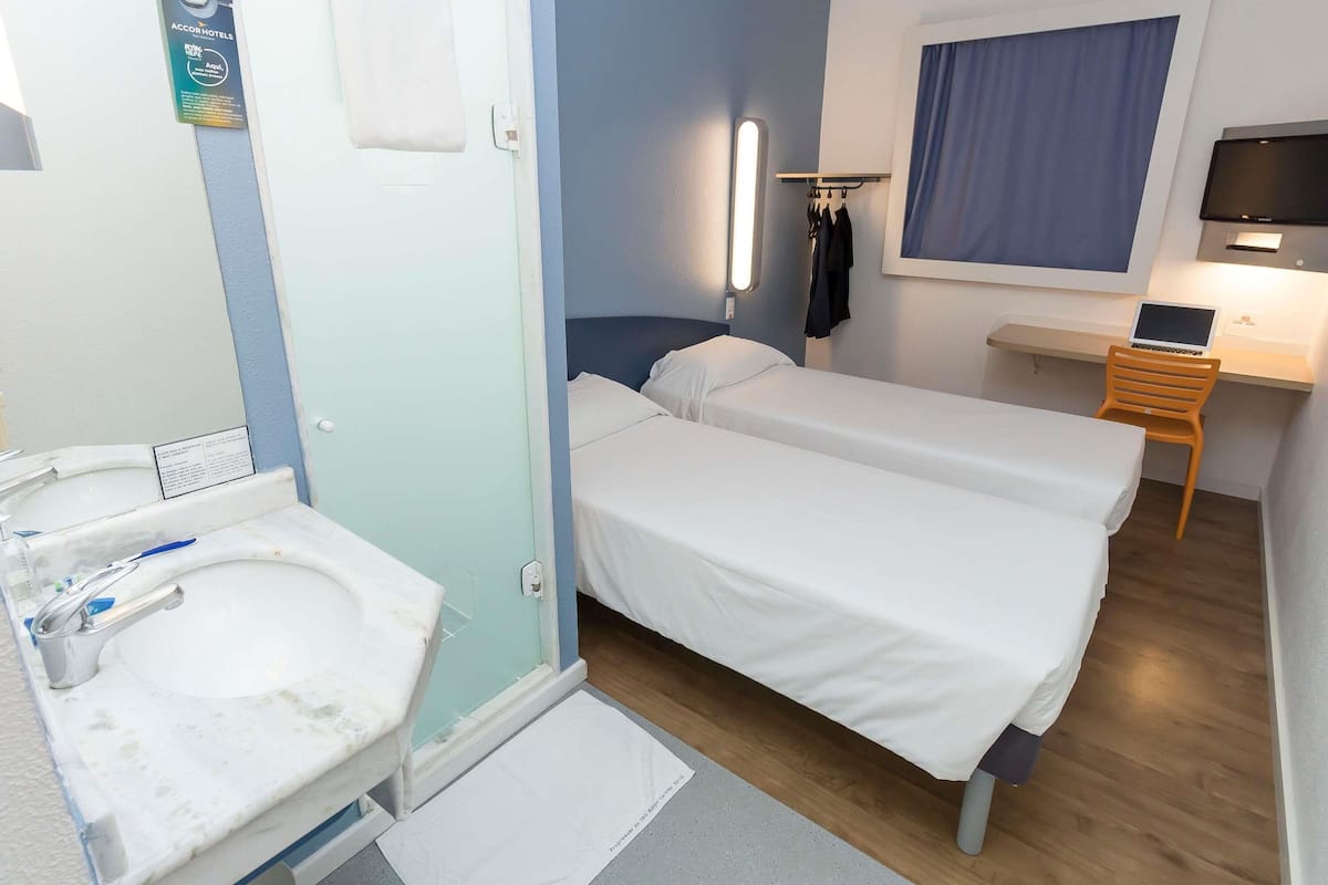 Desk, free WiFi, bed sheets