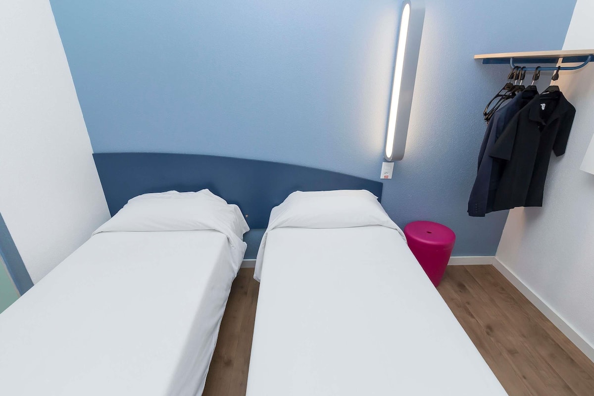 Desk, free WiFi, bed sheets