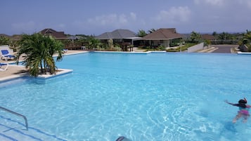 Outdoor pool, pool umbrellas, pool loungers