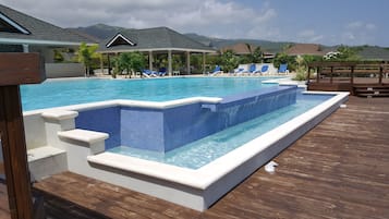 Outdoor pool, pool umbrellas, pool loungers