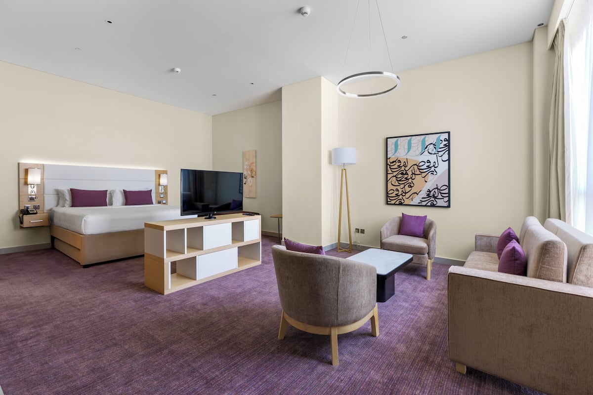 Executive Room | Premium bedding, minibar, in-room safe, desk