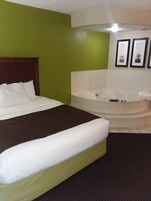 Escritorio, cortinas blackout y tabla de planchar con plancha 