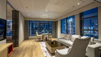 Executive Suite | Living area | 55-inch TV with digital channels