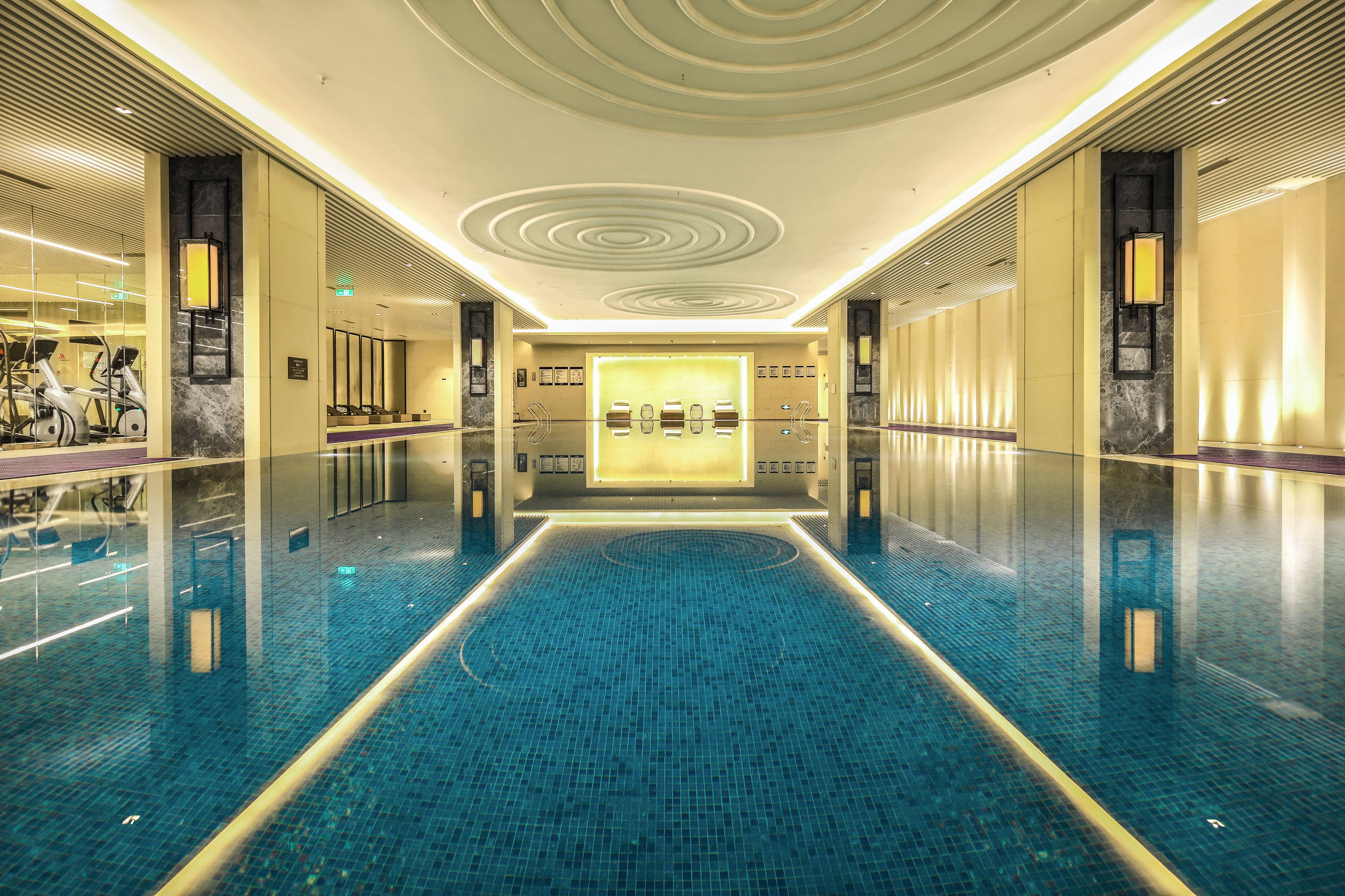 indoor pool, open 7:00 am to 11:00 pm, lifeguards on site