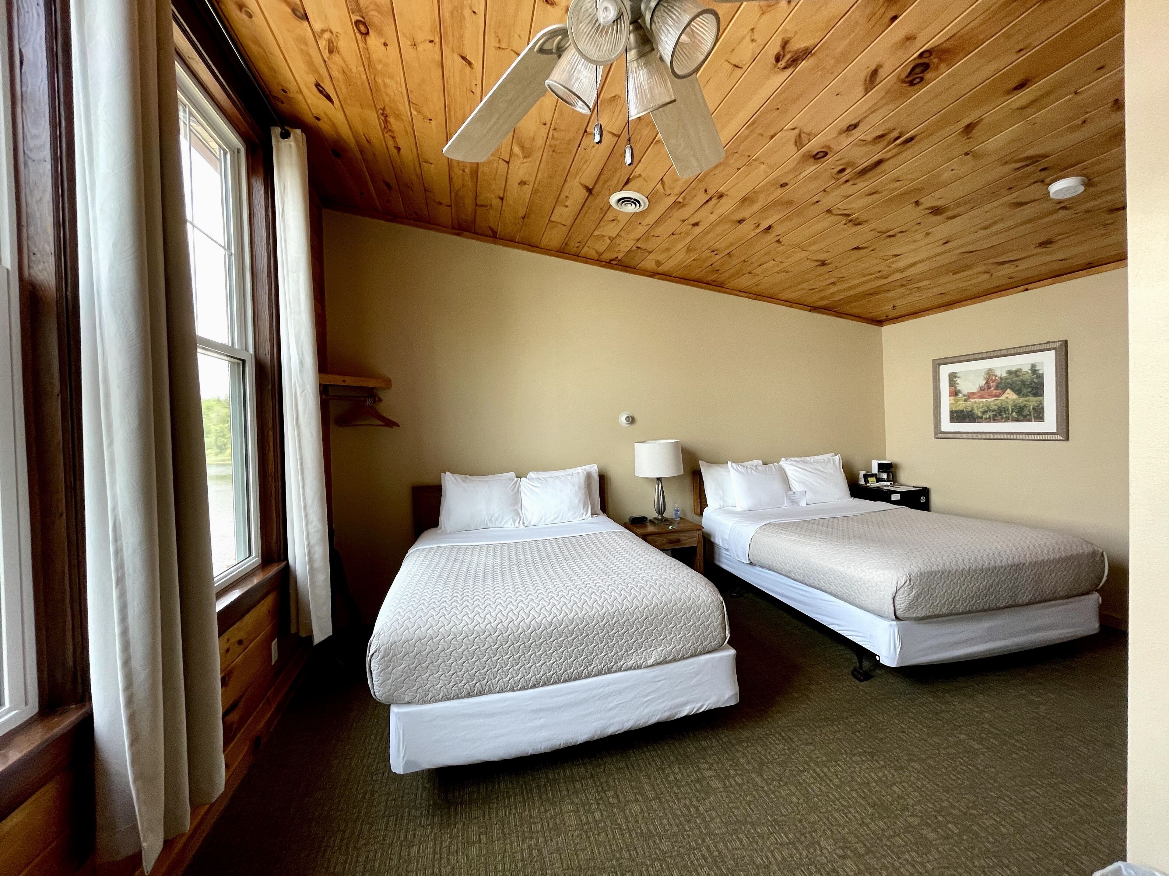 room, 2 queen beds, lake view, lakeside | living area | 32-inch flat-screen tv with digital channels, tv, dvd player