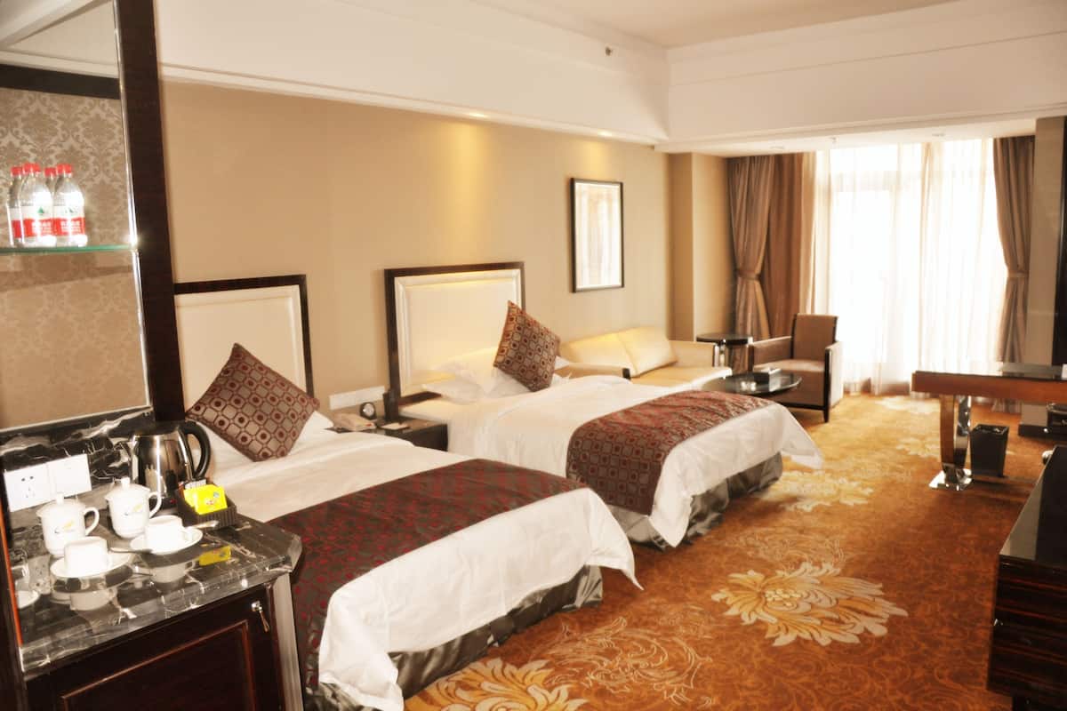 Superior Twin Room | Minibar, in-room safe, desk, blackout curtains