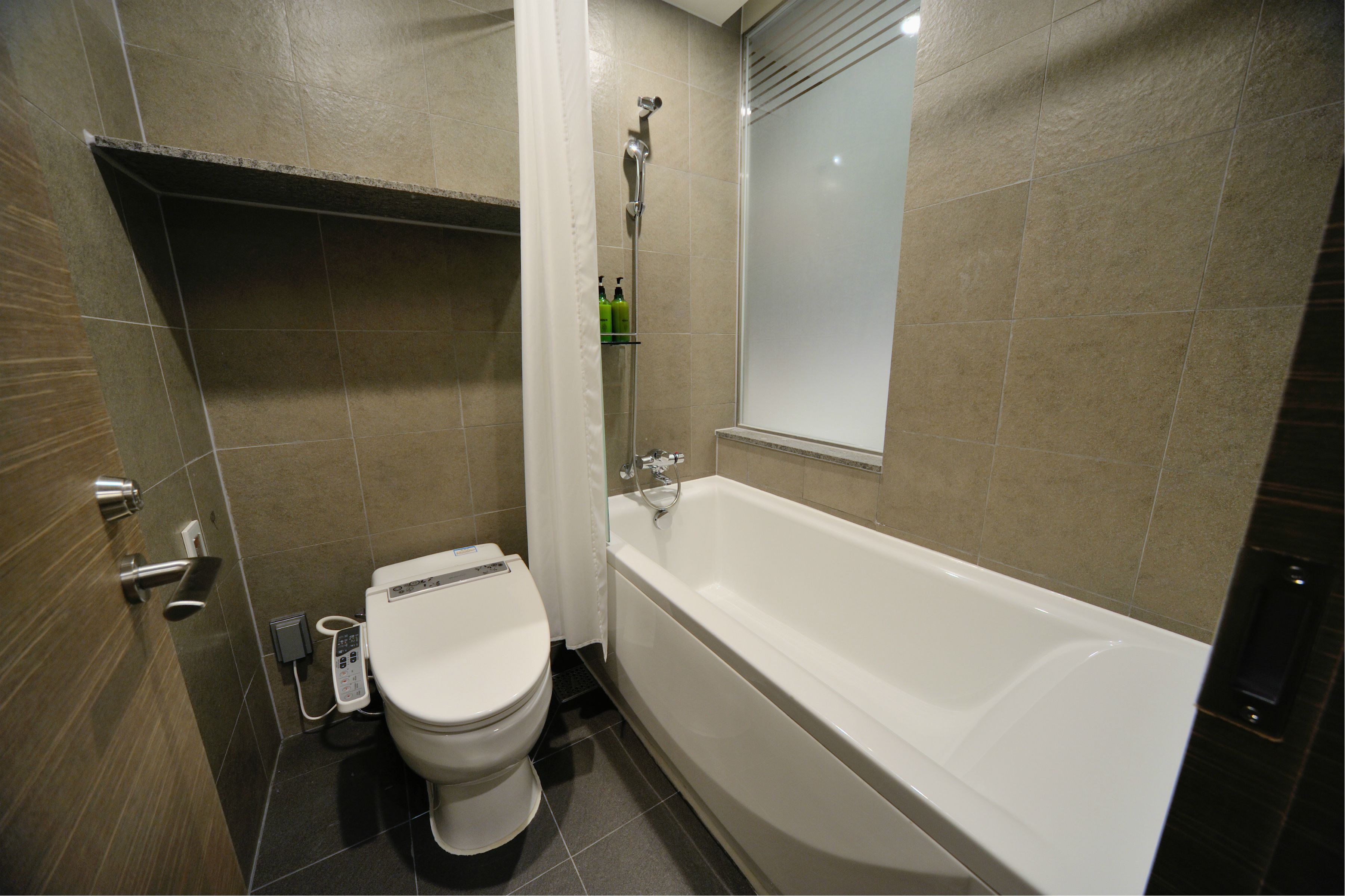 hair dryer, slippers, bidet, towels