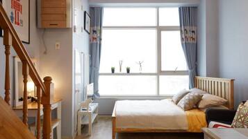 Deluxe Duplex, Private Bathroom | Egyptian cotton sheets, down comforters, desk