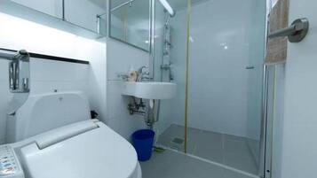 Shower, free toiletries, hair dryer, slippers