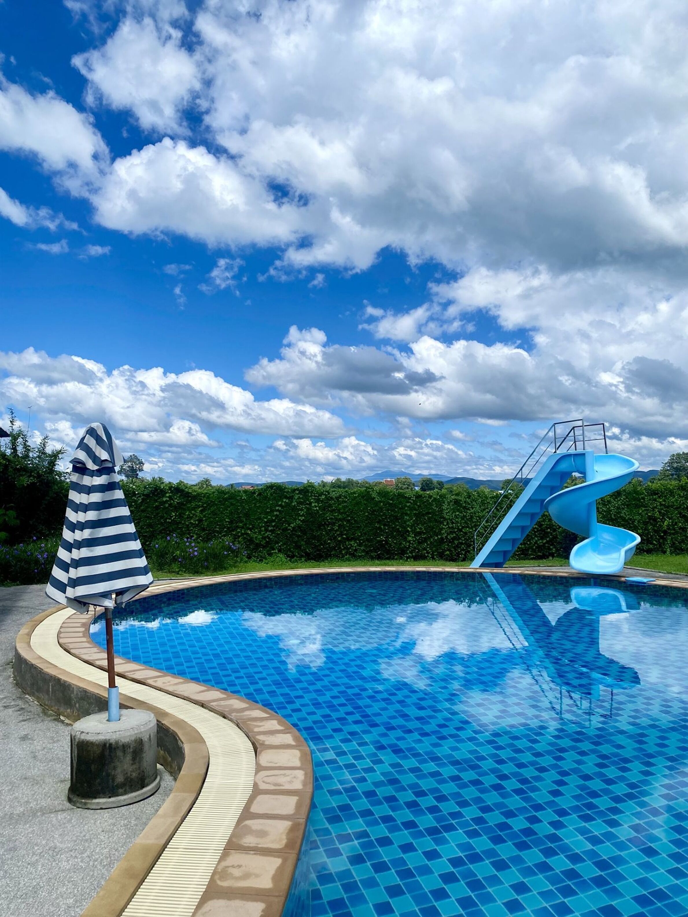 Outdoor pool, pool umbrellas, pool loungers