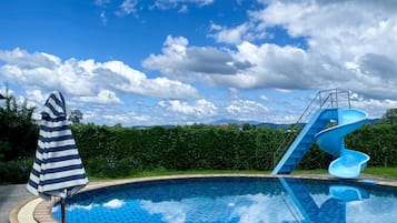 Outdoor pool, pool umbrellas, pool loungers