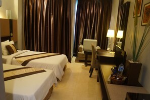 Habitación de lujo | Escritorio, cortinas blackout, wifi gratis y ropa de cama