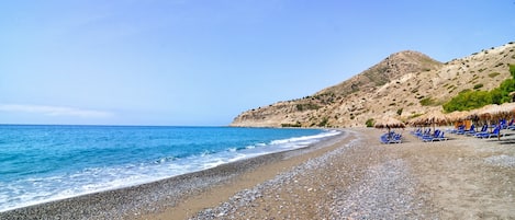 On the beach, scuba diving, water skiing